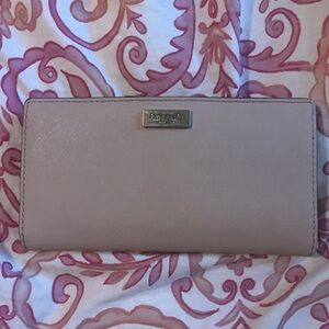 kate spade light blush pink Saffiano wallet with gold logo plaque